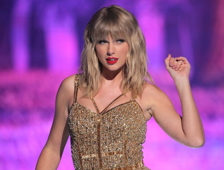 47th annual american music awards show microsoft theater los angeles usa 24 nov 2019 taylor swift amas alone female performing personality 85575667 dress finger person evening dress formal wear fashion adult woman solo performance