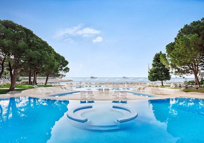 hotel resort pool water nature outdoors scenery swimming pool chair villa