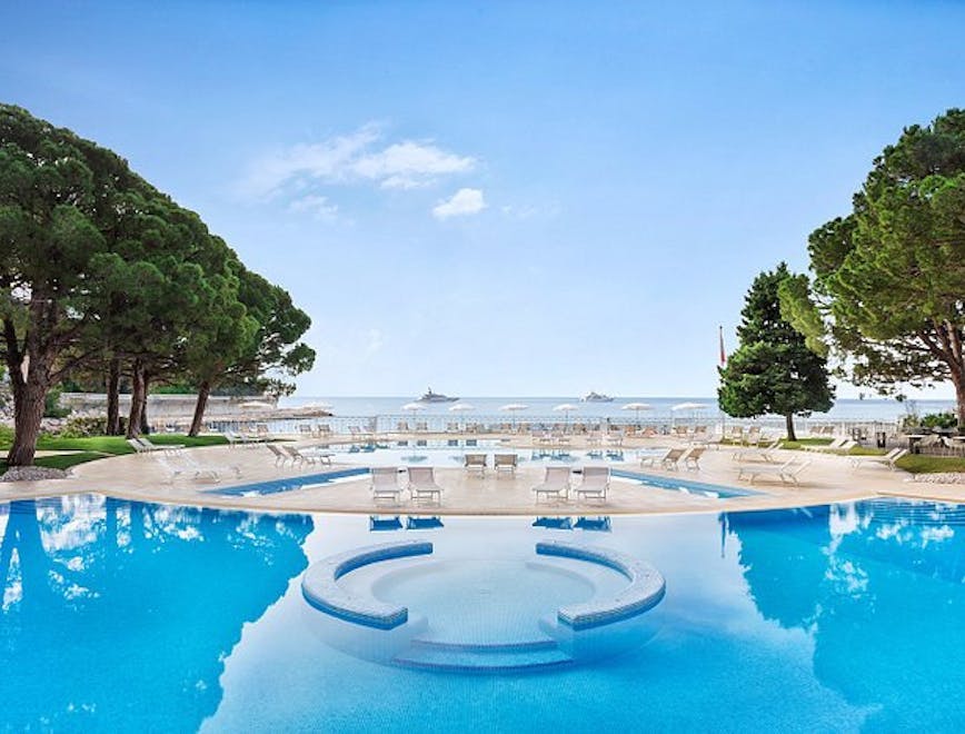 hotel resort pool water nature outdoors scenery swimming pool chair villa