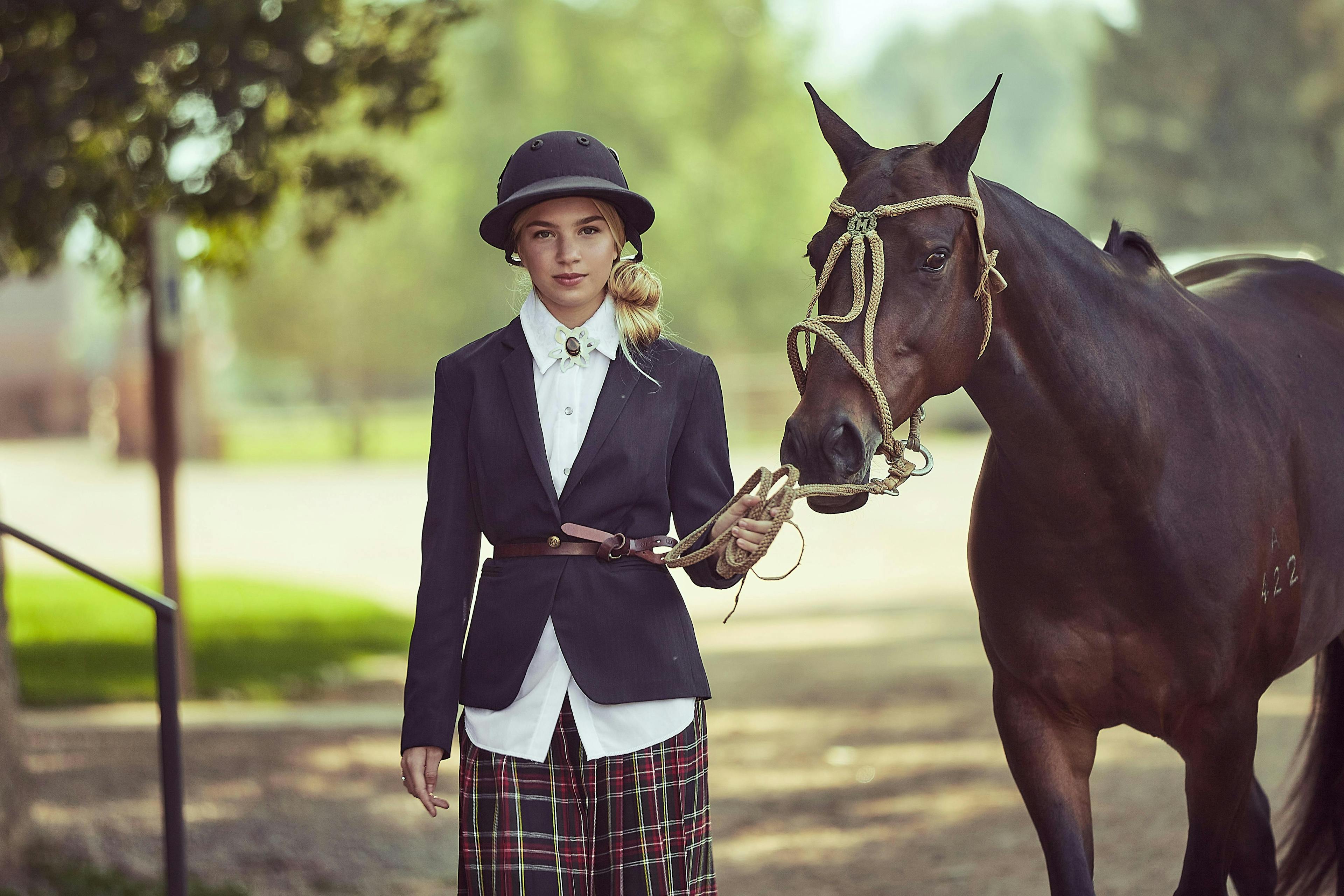 clothing apparel horse animal mammal person human equestrian female