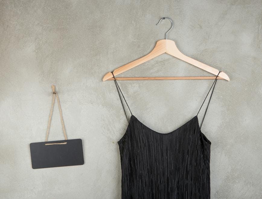 dress,beauty,apparel,beautiful,outfit,casual,copy space,garment,text,female,hanger,new,textile,fashionable,background,fabric,vintage,indoor,clothing,style,cloth,little,object,women,concrete,blackboard,blank,shop,color,concept,wear,summer,interior,modern,design,elegant,black,closet,store,clothes,grey,stylish,elegance,sale,choice,hanging,chalkboard,wall,fashion