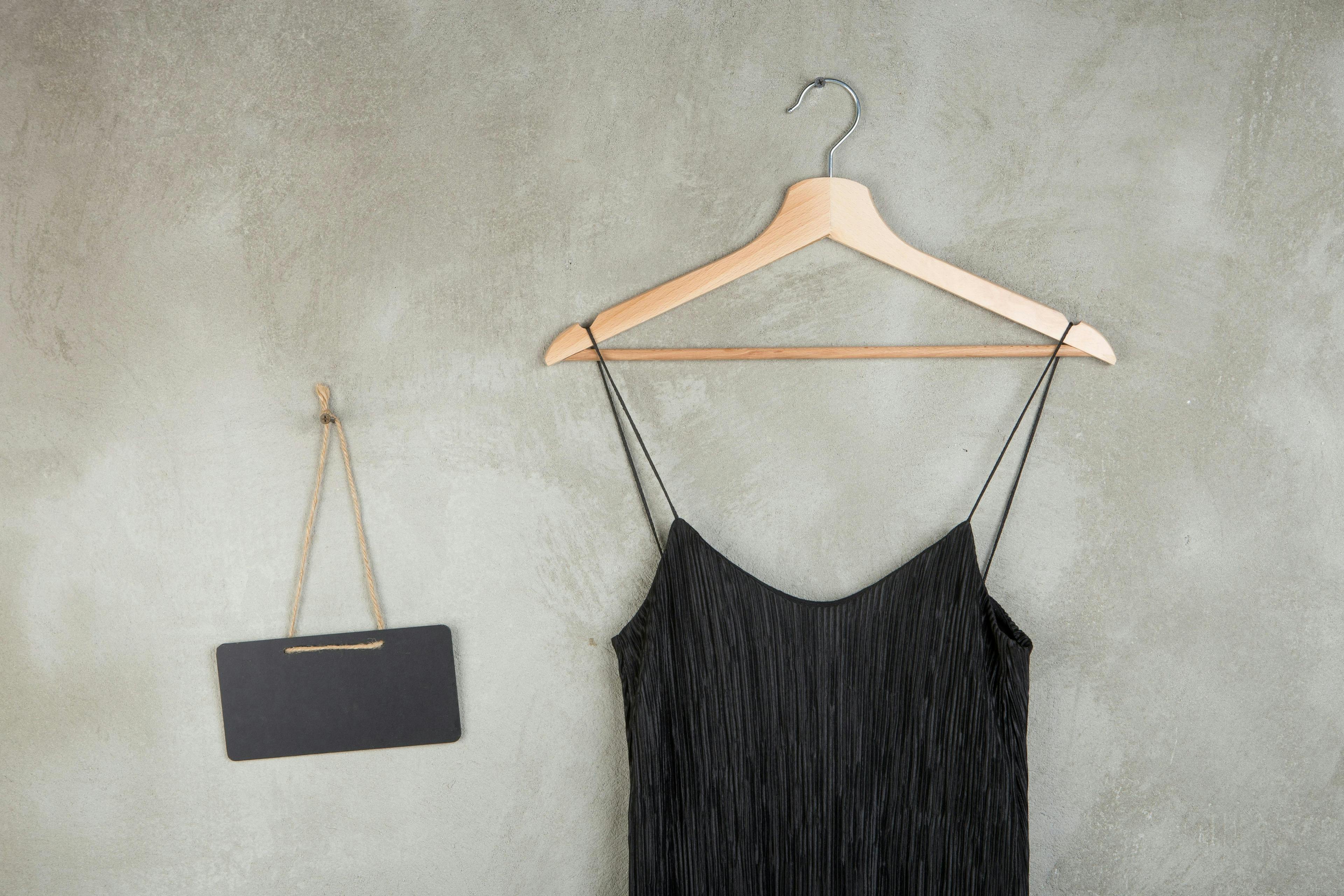 dress,beauty,apparel,beautiful,outfit,casual,copy space,garment,text,female,hanger,new,textile,fashionable,background,fabric,vintage,indoor,clothing,style,cloth,little,object,women,concrete,blackboard,blank,shop,color,concept,wear,summer,interior,modern,design,elegant,black,closet,store,clothes,grey,stylish,elegance,sale,choice,hanging,chalkboard,wall,fashion