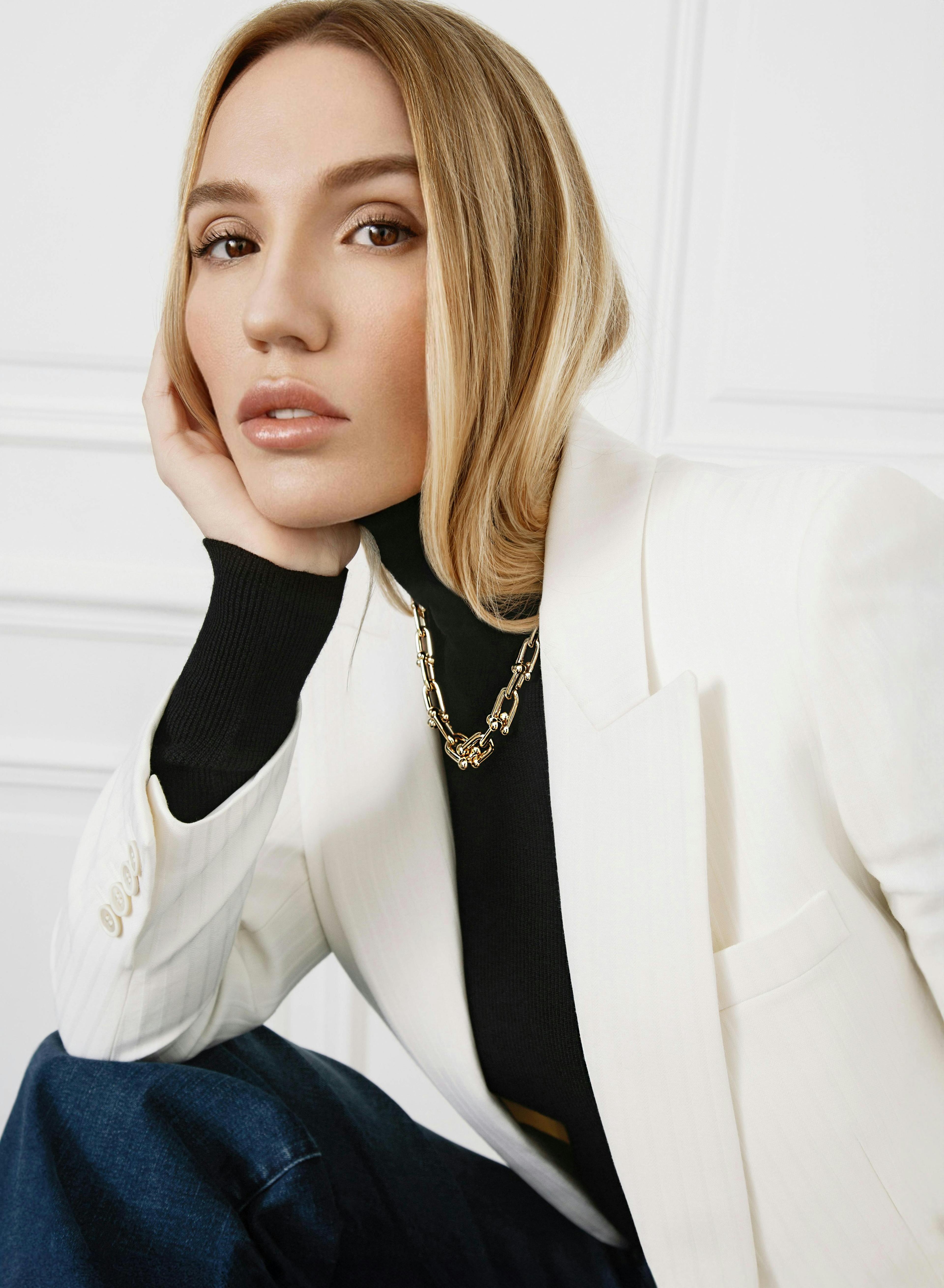 Jacket: Yves Saint Laurent, Jeans: Céline, Shoes: Magda Butrym, Jewelry: Tiffany & Co