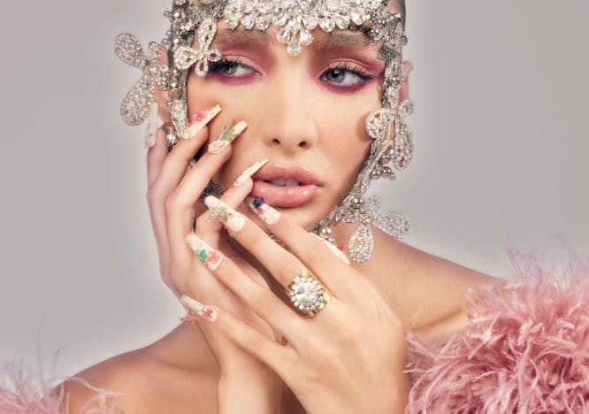 finger hand person nail face head photography portrait accessories diamond