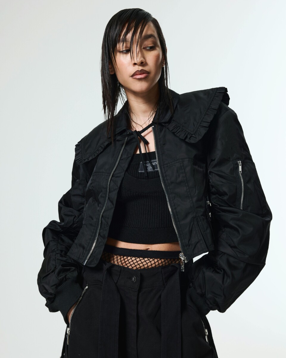 clothing coat jacket adult female person woman blazer necklace overcoat